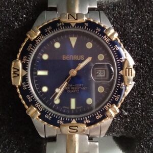 Benrus Mens Two Tone Blue Dial Compass Bezel Quartz Watch 100FT Water Resistant